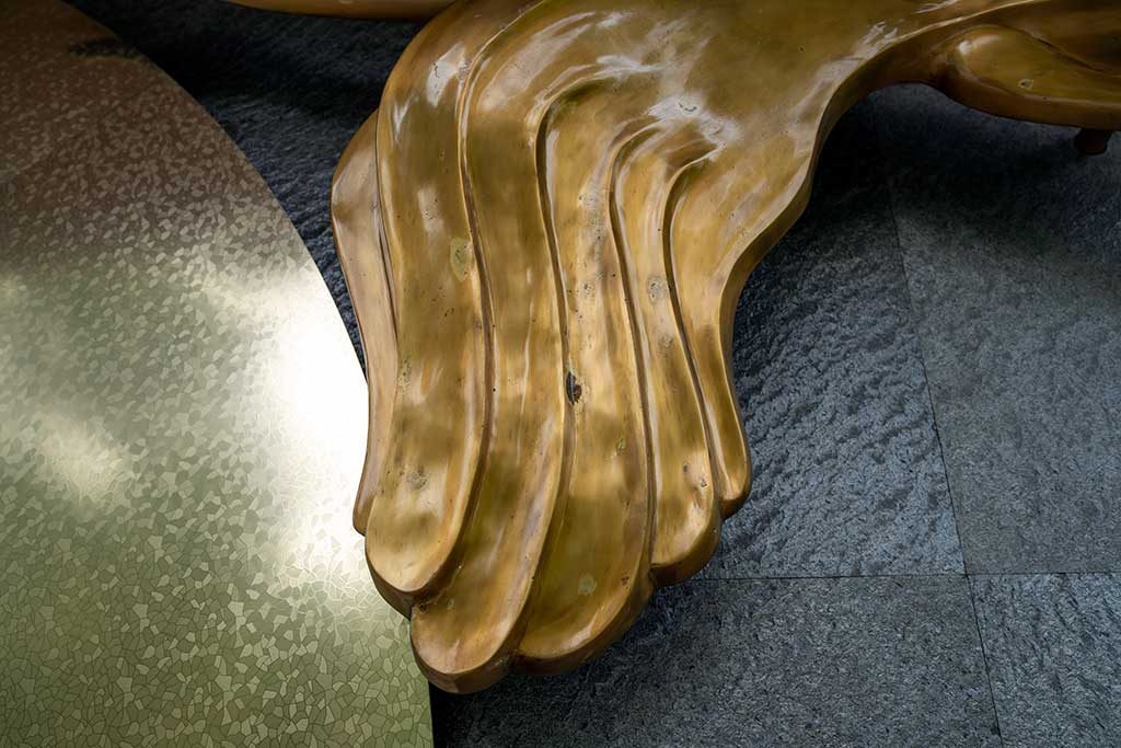 Before — uneven discolouration across wing feather detail