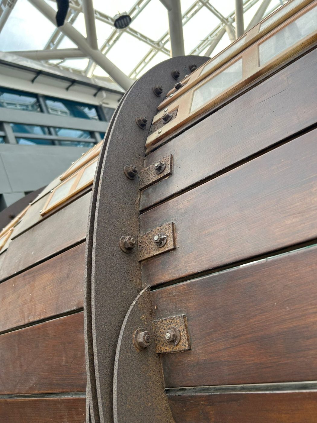 Before — rusted steel hardware and brackets