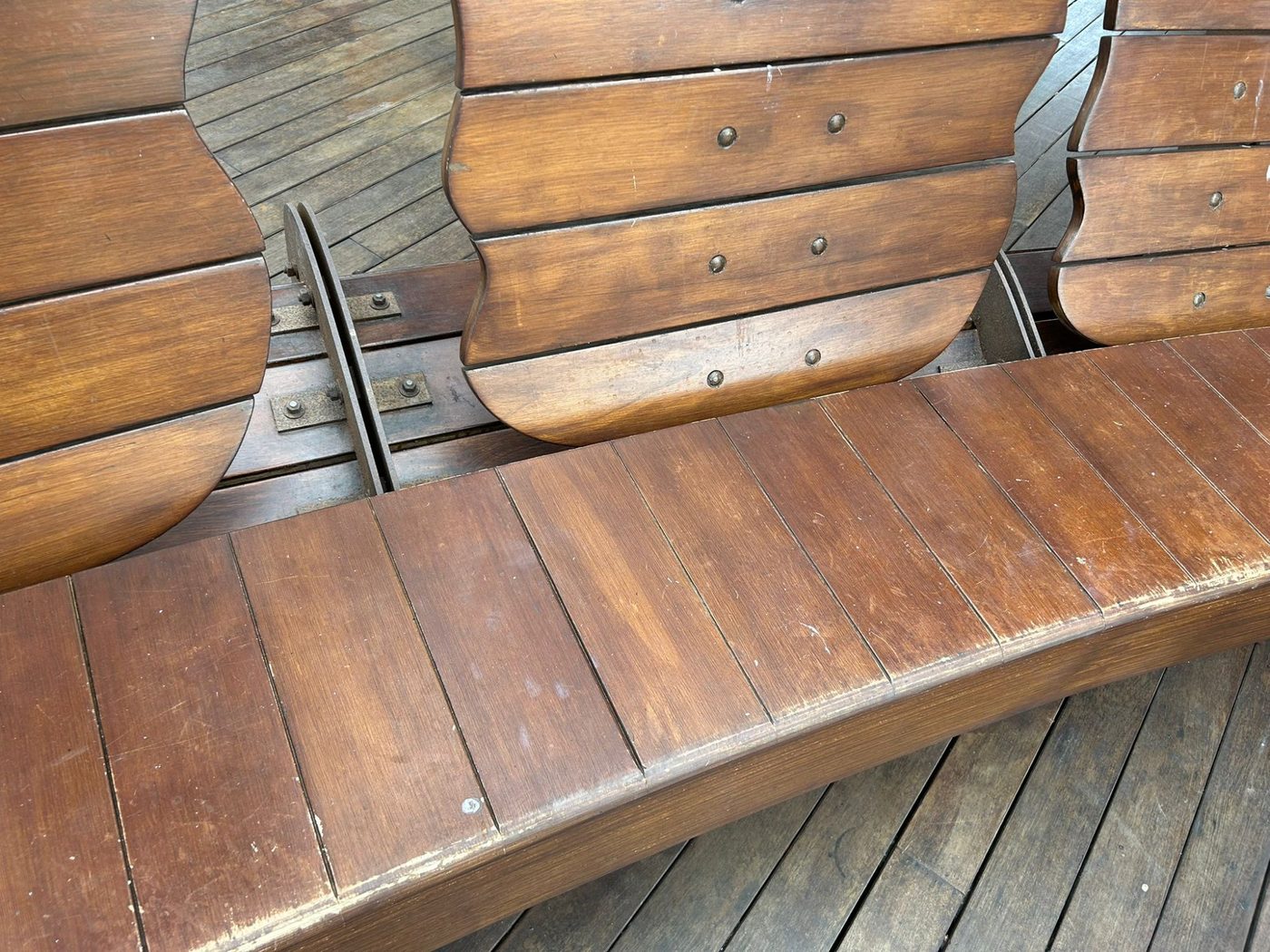 Before — overall view of worn bench surfaces